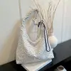 Bolsa de nylon floral estilo coreano, corte relajado, para mujer, colección nueva 2026, versátil para el trabajo y uso diario, bolsa de mano de gran capacidad que se puede llevar al hombro o cruzada