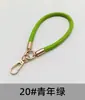 Pulseira de celular em couro PU outono novo, cordão curto para celular, corrente de celular anti-queda e anti-perda para uso externo, atacado