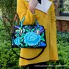 Estilo étnico bordado portátil bandolera doble uso bolsa tambor lona bordada bolsa floral viaje hombro portátil bolsa para mujer