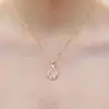 Puesto de suministro de versión coreana del collar de oro rosa imitación de polvo de piedra de hibisco Cristal de mujer colgante de cadena de clavícula joyería