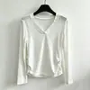 Camiseta versátil con botones irregulares, algodón de bambú, cintura plisada, escote en V profundo sexy, mangas largas, nuevo modelo para primavera, verano y otoño 2026