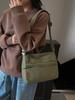 Moda Transfronteriza Simple Casual Versátil Bolso de Hombro 2025 Nuevo Ligero Color Sólido Bolso Cruzado Bolso Pequeño para Viajeros