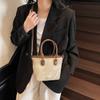 Bolso de textura de alta calidad para mujer, nuevo bolso de cubo portátil de nicho de moda de tendencia 2025, bolso bandolera informal retro para hombro.