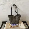 Bolsa de Mão Estampa de Leopardo Feminina Grande Capacidade 2026 Nova Outono Inverno Nicho Vintage Ombro Único Axila Bolsa Trabalho Deslocamento Bolsa Saco