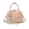 Bolso de Mano de Moda Simple y Versátil Estilo Carcasa para Mujer 2026 Primavera Nuevo Elegante Bolso de Hombro Cruzado con Textura de Alta Calidad