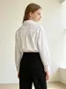 Design de comércio exterior senso de nicho chique top para meninas estilo fino 2026 novo cordão branco camisa de uniforme escolar