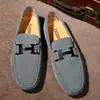 Mocassins masculinos de couro genuíno fosco para venda quente em transmissões ao vivo transfronteiriças, sapatos casuais britânicos para jovens, versáteis, sola macia, modernos