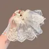 Estilo Francés Súper Hada Malla de Encaje Falda Oscilante Círculo Intestino Delgado Atmósfera Lazo Cola de Caballo Baja Cuerda para el Cabello Flor para el Cabello de Celebridad de Internet Accesorios para el Cabello