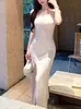 Vestido de tricô puramente sedutor com gola halter, feminino e justo ao corpo, vestido bodycon elástico com fenda, saia longa