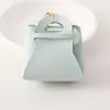 Nova Bolsa de Moedas Colorida Criativa Chaveiro de Fone de Ouvido Moda Feminina Versátil Bolsa de Armazenamento de Couro Pingente Presente