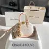 Bolsa de concha estampada rosa de lujo ligero para dropshipping, nueva moda 2026, bolso de mano de alta gama al por mayor