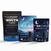 Fabricante transfronteiriço de fita para boca de dormir em inglês personaliza fita para boca de dormir com abertura da boca, fita para boca de correção respiratória, fita de tecido elástico OEM
