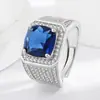 Anillos de tachuelas de zafiro tanzanita simulada de cinco quilates para hombre europeos y americanos con anillos de diamantes, Anillos dominantes plateados, Anillos de moda para hombre al por mayor