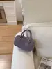 Bolsa de Moda de Luxo para Mulheres 2026 Nova Tendência Simples Bolsa de Mão Bolsa de Ombro Versátil Transversal Pequena Quadrada para o Dia a Dia