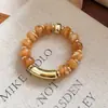 Pulsera elástica de cuentas redondas acrílicas transfronteriza europea y americana, moderna y versátil para el uso diario, joyería de diseño de nicho