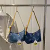 Bolso Casual y Versátil de un Solo Hombro para Axila para Mujer Tendencia Primavera 2025 Ropa de Trabajo Moda Bolso de Denim tipo Dumpling