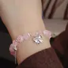 Pulsera de cristal rosa natural piedra hibisco pulsera de moda pulsera rosa pequeña y fresca en stock accesorios de principios de primavera al por mayor