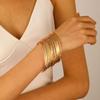 Pulsera de aleación de estilo étnico transfronterizo vintage ancha traje para mujer pulsera dorada lisa pulsera juego de diez piezas