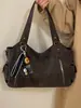 Bolso Tote de Gran Capacidad de Nicho para Mujer 2026 Nuevo Vintage para Viajes Diarios Bajo el Brazo Bolsa para Motociclista con Múltiples Bolsillos Bolso de Hombro Único Cruzado