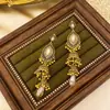 Pendientes exóticos bohemios retro para mujer, largos, estilo nuevo palacio, pendientes de temperamento, pendientes de estilo nacional