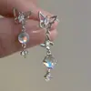 Versión coreana de los nuevos pendientes de mariposa con diseño de nicho de aguja de plata S925, pendientes de clip de oreja sin orificio para la oreja de alto sentido, venta al por mayor para mujeres