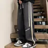 Calças casuais compridas masculinas para primavera e outono, nova tendência 2026, oversized, soltas, perna larga, versáteis, esportivas, de moletom