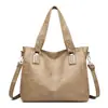 Bolsa de ombro vintage popular para comércio exterior, nova bolsa tote de grande capacidade para cross-border, bolsa de mão e bolsa transversal versátil para o dia a dia