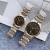 Transmisión en vivo de Tiktok reloj de pareja de acero al cuarzo con banda de berenjena europea tendencia de moda para parejas