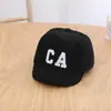 Gorra de Pana Infantil Coreana con Visera Corta Moda Otoño Hombres y Mujeres Bebé Color Sólido Bordado de Letras Gorra de Béisbol Moderna