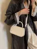 Bolso pequeño transfronterizo 2026 nuevo super popular para mujer, bolso de hombro de alta gama, bolso cruzado cuadrado pequeño