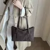 Bolsa de mano 2026 otoño transfronteriza nueva retro mate patchwork gran capacidad para ir al trabajo hombro axila bolsa al por mayor