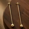 Aretes de Metal con Tachuela de Doble Perla y Pasador Largo Personalizados Cruzados Aleación de Hierro Geométricos Dorados para Mujer Pendiente de Comercio Exterior Pendiente de Personalidad para Mujer