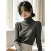 Suéter de punto de cuello alto para mujer, nuevo estilo otoño e invierno, ajuste ceñido, muestra la figura delgada, suéter base, prenda interior, top de manga larga, tacto de alta gama, color liso