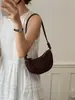 Nova bolsa versátil de camurça para axila, bolsa de ombro com franjas para primavera/verão 2026 para mulheres