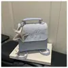 Bolso de Nicho Súper Popular para Mujer 2026 Nueva Moda Cuadros Simple Estilo Universitario Versátil Mochila Bolso Cruzado