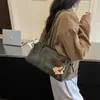 Estilo Coreano Retro Nicho Gran Capacidad Bolso de Axila para Mujer 2026 Nuevo Bolso de Hombro Único para el Trabajo Bolso Tote Versátil de Moda