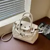 Bolsa de mão com textura de luxo leve, simples, moda de comércio exterior, padrão lichia, bolsa platina, versátil para o dia a dia, ombro único, transversal, bolsa feminina