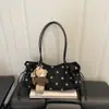 Otoño 2026 Nuevo Estilo Perezoso Lunares Diseño Nicho Moda Gran Capacidad Simple Elegante Versátil Bolso de Hombro Simple