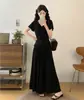 Conjunto de Verano para Mujeres de Tallas Grandes: Conjunto Casual Elegante de Dos Piezas: Top de Manga Corta con Escote en V y Cintura Irregular y Falda