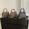 La popular bolsa de mensajero para mujer de este año 2023, nuevo bolso de mano informal estilo western, bolso de cubo de un solo hombro estilo coreano de nicho