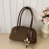 Bolsa Flauta de Camurça Fashion Feminina 2026 Nova Bolsa de Ombro Boston Retro Casual de Grande Capacidade para o Dia a Dia