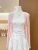 Cardigan de Tricô Elegante com Proteção Solar de Manga Longa Slim-Fit Simples Versátil de Botão Único Rosa Novo para o Verão de 2026