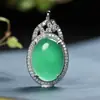 Colgante de jade malayo oro incrustado jade circón diseño creativo de nicho estilo ins versátil moda colgante de collar al por mayor