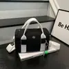 2026 Nueva Moda Bolso de Hombro Único Estilo Coreano para Mujer Alta Apariencia Bolso de Mano Tipo Almohada Casual Ligero para Viaje Bolso Cruzado