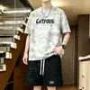 Conjunto de Camiseta Tie-dye de Verão 2026 Masculino Top Solto com Estampa de Letras Gradiente Cordão Shorts de Cinco Pontos Conjunto de Duas Peças