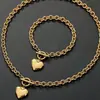 Venta Cruzada Amazon Más Vendido Europeo y Americano Set Sencillo Hebilla OT Colgante Pulsera Acero Inoxidable Forma de Corazón para Hombres y Mujeres