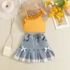 Conjunto de Top sin Mangas de Encaje con Cordones de Hombro Único Estilo Europeo y Americano Verano 2026 con Adorno de Encaje de Lazo y Falda de Mezclilla
