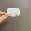 Brincos de Gato Olho de Gato Borboleta Design de Nicho Moda Simples Exquisitos Versáteis Super Fada Francesa Doce