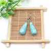 Venta al por mayor de fábrica aretes largos de cristal natural forma de gota de agua amatista Ojo de Tigre Joyería con gancho para la oreja aretes redondos de gota de agua DIY