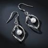 Fornecimento de Fábrica Brincos de Pérola Giratórios Criativos Studs Elegantes de Folhas Vazadas para Mulheres Brincos Planos Torcidos